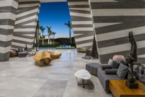 Beautiful entrance to Cabo resort with architectural features and ocean views