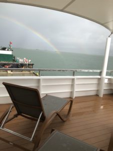 Rainbow viewed from Sun Deck of National Geographic Venture
