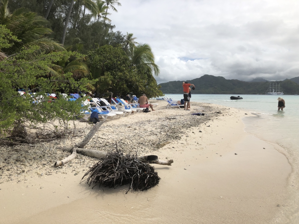 Beach on a remote motu in Tahiti